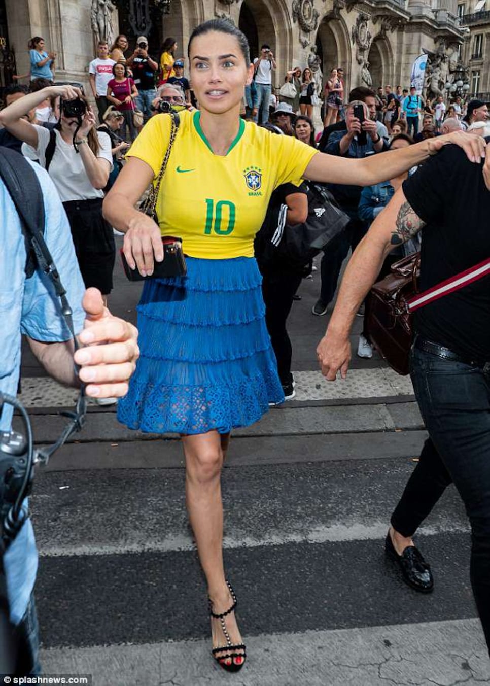 Adriana Lima Wears a Brazil Soccer Jersey At Couture Fashion Week