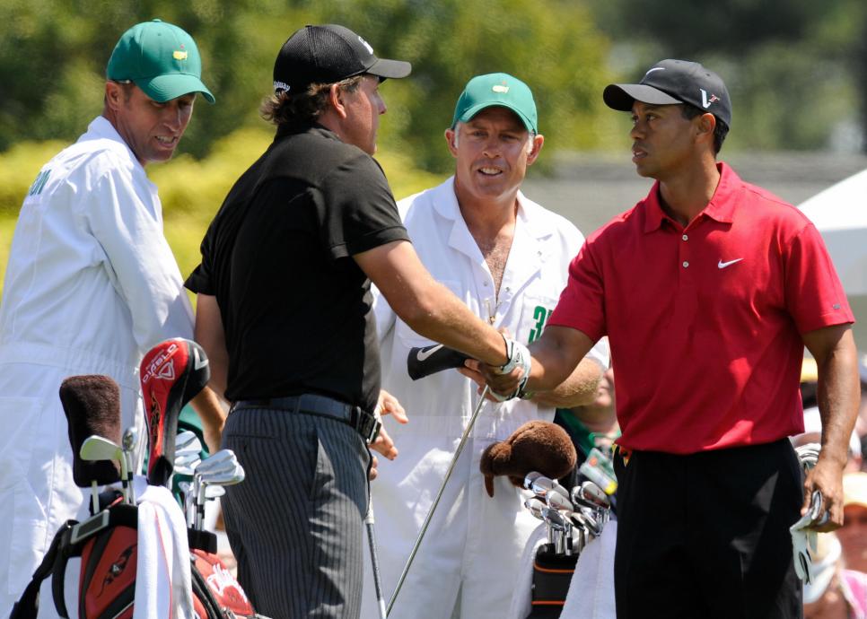 US golfers Phil Mickelson (2nd L) and Ti