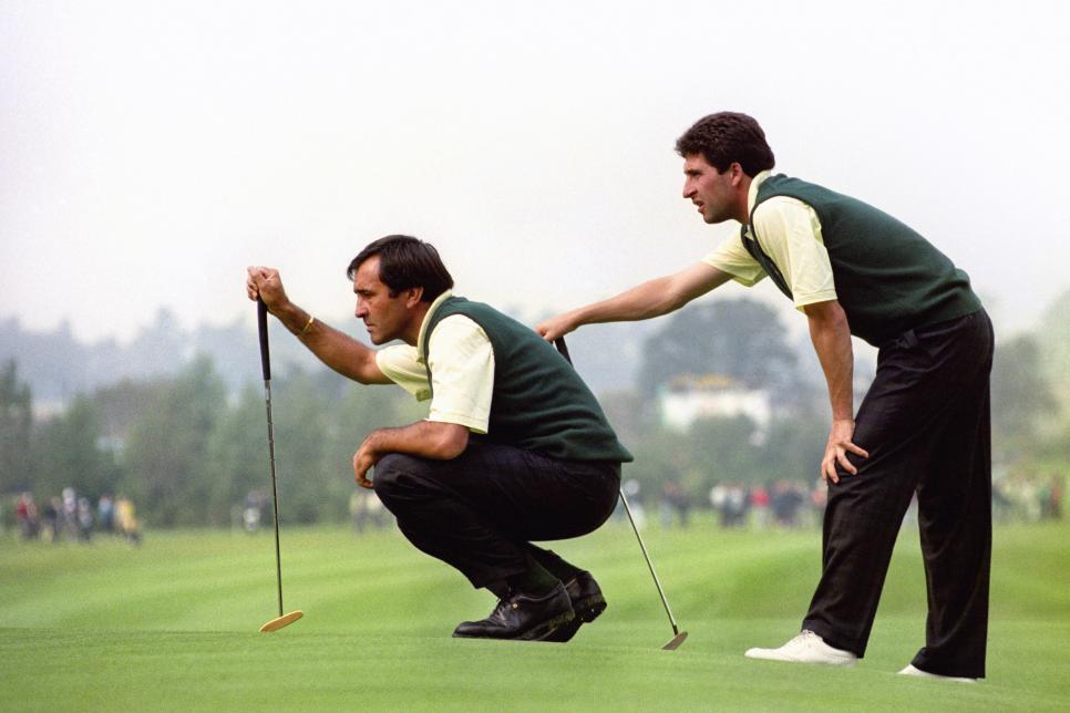 Europe\'s Spanish pairing of Seve Ballesteros, left, and Jose Maria Olazabal, line up a shot during Ryder Cup match against Tom Kite and Davis Love III.   (Photo by PA Images via Getty Images)