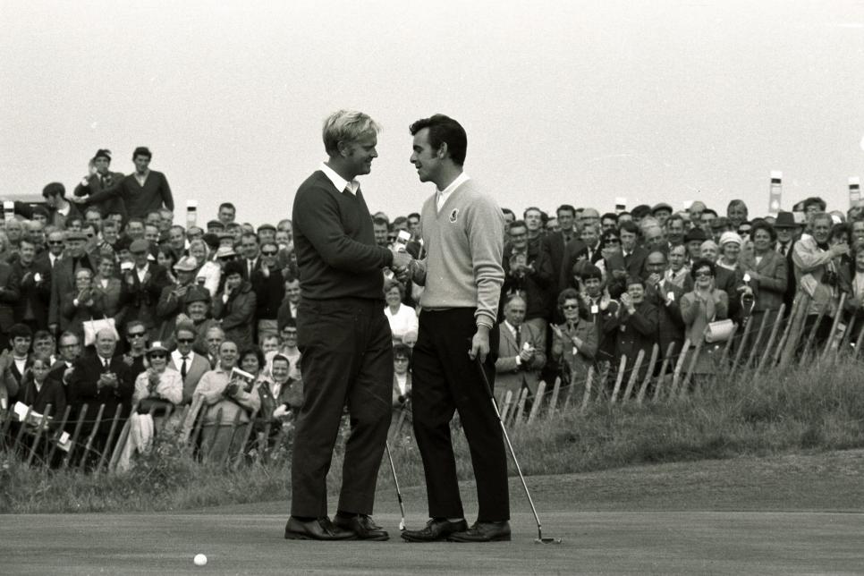 Congratulations from Jack Nicklaus (USA) to Tony Jacklin (Great Britain), right, after the British player beat him 4 and 3 in the Ryder Cup Golf Match at Royal Birkdale.   (Photo by PA Images via Getty Images)