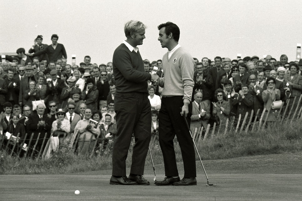 Congratulations from Jack Nicklaus (USA) to Tony Jacklin (Great Britain), right, after the British player beat him 4 and 3 in the Ryder Cup Golf Match at Royal Birkdale.   (Photo by PA Images via Getty Images)