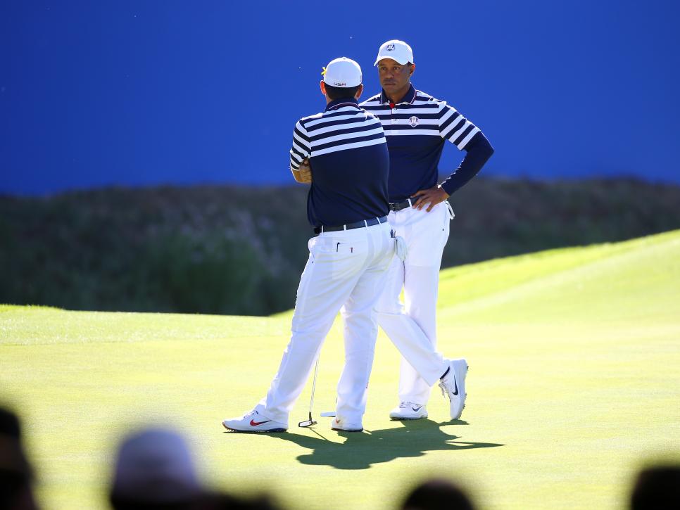 USA\'s Tiger Woods (right) and Patrick Reed during preview day three of the Ryder Cup at Le Golf National, Saint-Quentin-en-Yvelines, Paris. (Photo by Gareth Fuller/PA Images via Getty Images)