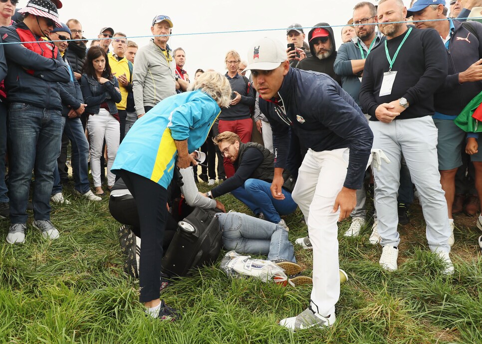 brooks-keopka-injured-woman-friday-ryder-cup-2018.jpg