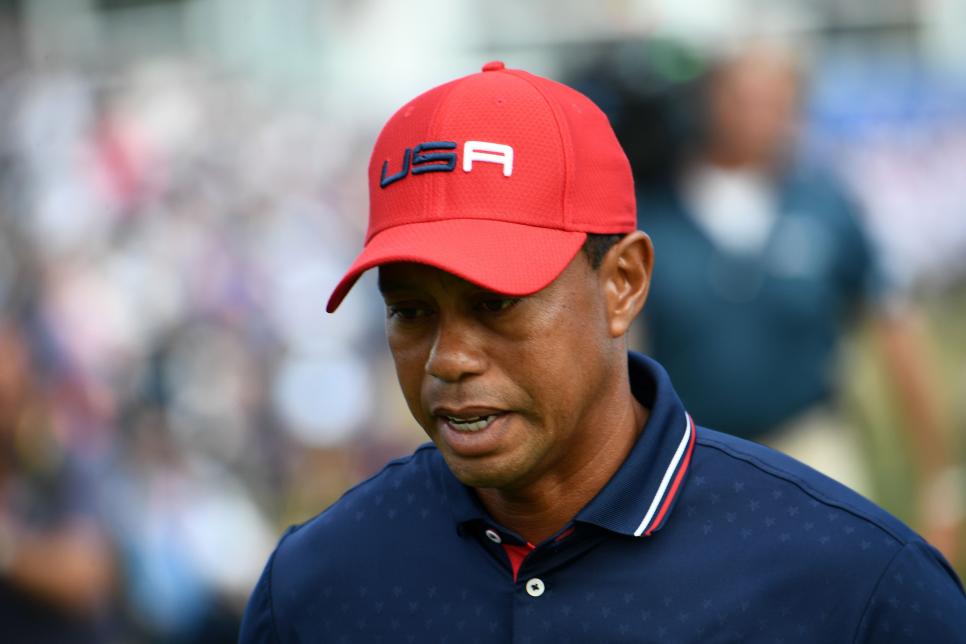 TOPSHOT - US golfer Tiger Woods reacts during his singles match with  Europe\'s Spanish golfer Jon Rahm on the third day of the 42nd Ryder Cup at Le Golf National Course at Saint-Quentin-en-Yvelines, south-west of Paris, on September 30, 2018. (Photo by FRANCK FIFE / AFP)        (Photo credit should read FRANCK FIFE/AFP/Getty Images)