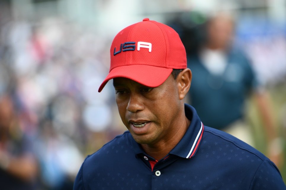 TOPSHOT - US golfer Tiger Woods reacts during his singles match with  Europe\'s Spanish golfer Jon Rahm on the third day of the 42nd Ryder Cup at Le Golf National Course at Saint-Quentin-en-Yvelines, south-west of Paris, on September 30, 2018. (Photo by FRANCK FIFE / AFP)        (Photo credit should read FRANCK FIFE/AFP/Getty Images)