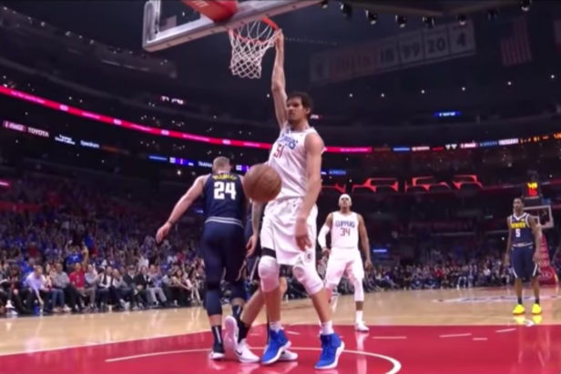 Boban Marjanovic throws down a flat-footed dunk