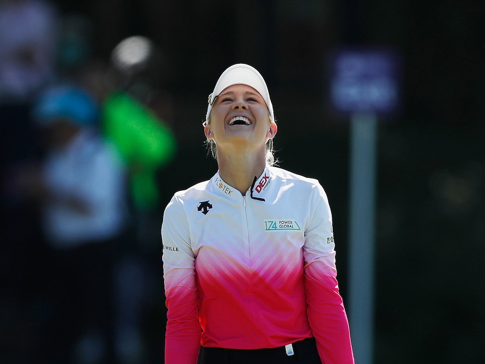 nelly-korda-swinging-skirts-2018-sunday-18th-hole-smile.jpg