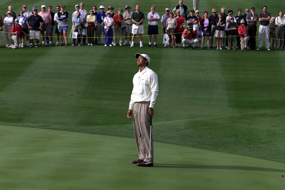 Tiger Woods of the US reacts on the fourth green d