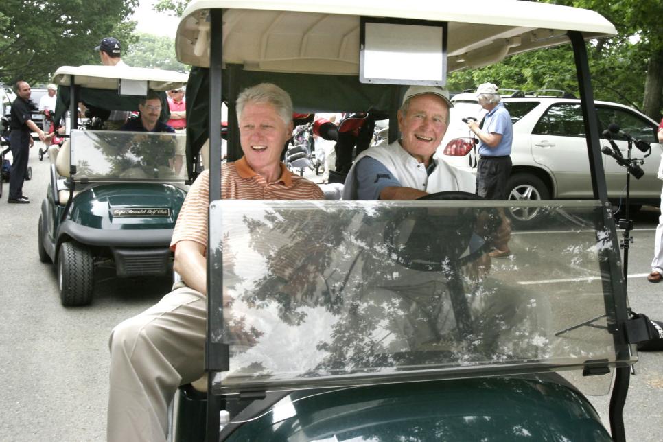Staff photo by Gregory Rec -- Tuesday, June 28, 2005 -- Former presidents Bill Clinton and George H.W. Bush drive to the first tee at the Cape Arundel Golf Course in Kennebunkport on Tuesday. Clinton was visiting the Bush family while in town for a book signing.  (Photo by Gregory Rec/Portland Press Herald via Getty Images)