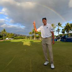 HONOLULU, HI - JANUARY 13: Matt Kuchar points to a rainbow over the 18th hole after winning the Sony Open in Hawaii at Waialae Country Club on January 13, 2019 in Honolulu, Hawaii. (Photo by Stan Badz/PGA TOUR)