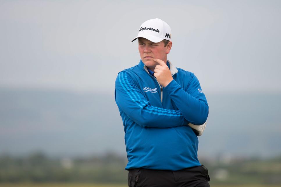 BRIDGEND, WALES - JUNE 18:  Robert MacIntyre of Glencruitten shows his frustration after a shot ended up in the rough during the Final of The Amateur Championship 2016 - Day Six at Royal Porthcawl Golf Club on June 18, 2016 in Bridgend, Wales.  (Photo by Matthew Horwood/Getty Images)