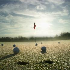 Driving range with ice crystals melting in morning sun (wide angle)
