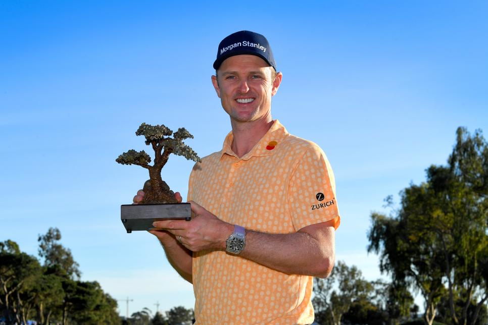 SAN DEIGO, CA - JANUARY 27: Justin Rose of England celebrates with the winner\'s trophy at the Farmers Insurance Open at Torrey Pines South on January 27, 2019 in San Diego, California. (Photo by Stan Badz/PGA TOUR)