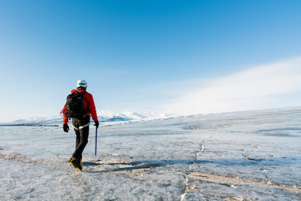 Tourist Hiking over Glacier, Iceland