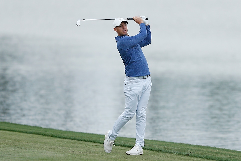 PONTE VEDRA BEACH, FLORIDA - MARCH 16:   Rory McIlroy of Northern Ireland plays his second shot on the 18th hole during the third round of The PLAYERS Championship on The Stadium Course at TPC Sawgrass on March 16, 2019 in Ponte Vedra Beach, Florida. (Photo by Michael Reaves/Getty Images)