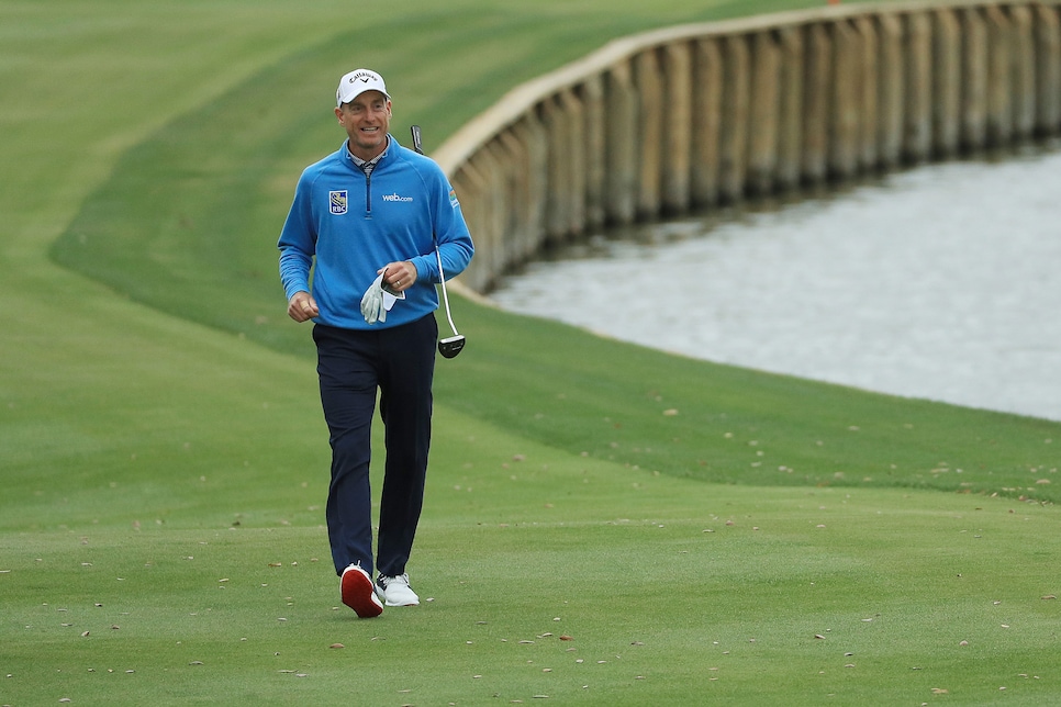 PONTE VEDRA BEACH, FLORIDA - MARCH 17: Jim Furyk of the United States walks up to the 18th green during the final round of The PLAYERS Championship on The Stadium Course at TPC Sawgrass on March 17, 2019 in Ponte Vedra Beach, Florida. (Photo by Mike Ehrmann/Getty Images)