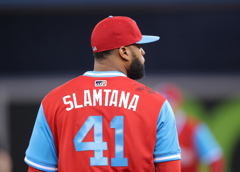 Legendary baseball guy Carlos Santana smashed a TV with a bat to