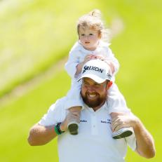 AUGUSTA, GEORGIA - APRIL 10: Shane Lowry of Northern Ireland carries his daughter Iris during the Par 3 Contest prior to the Masters at Augusta National Golf Club on April 10, 2019 in Augusta, Georgia. (Photo by Kevin C. Cox/Getty Images)