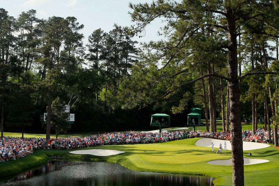 AUGUSTA, GEORGIA - APRIL 13: A general view as Tiger Woods of the United States stands on the 16th green during the third round of the Masters at Augusta National Golf Club on April 13, 2019 in Augusta, Georgia. (Photo by Kevin C. Cox/Getty Images)