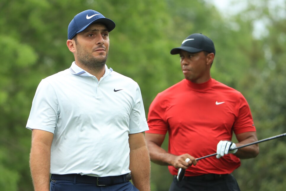 AUGUSTA, GEORGIA - APRIL 14: (L-R) Francesco Molinari of Italy and Tiger Woods of the United States walk off the fifth tee during the final round of the Masters at Augusta National Golf Club on April 14, 2019 in Augusta, Georgia. (Photo by Andrew Redington/Getty Images)