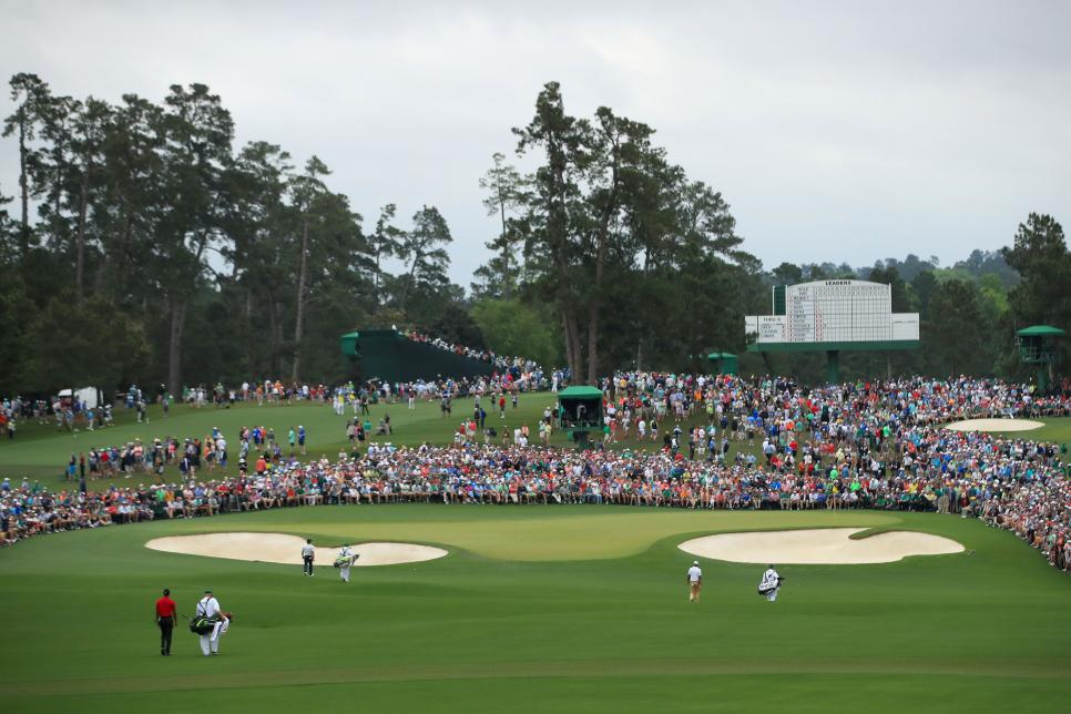 AUGUSTA, GEORGIA - APRIL 14: Tiger Woods of the United States, Francesco Molinari of Italy and Tony Finau of the United States walk on the second hole during the final round of the Masters at Augusta National Golf Club on April 14, 2019 in Augusta, Georgia. (Photo by Andrew Redington/Getty Images)
