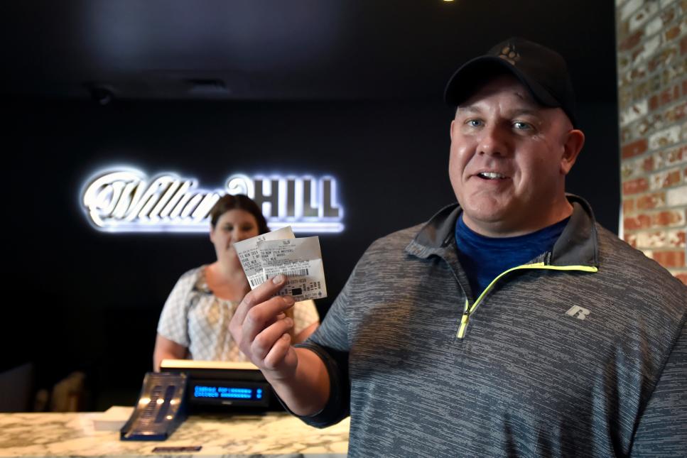 William Hill US Presents Bettor With $1.19M Check At William Hill Sports Book At SLS Casino After Tiger Woods' Masters Victory
