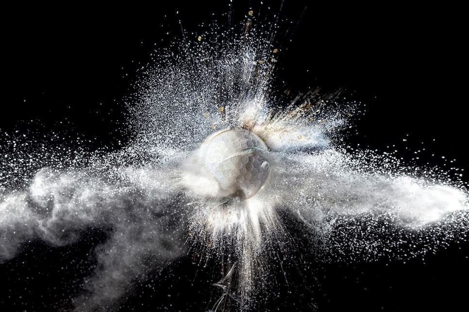 Close-Up Of Broken Light Bulb Against Black Background