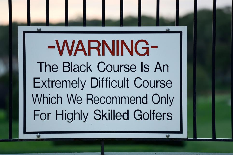 The famed warning sign overlooking the first tee at the Black Course