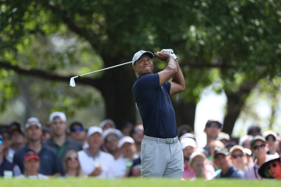 AUGUSTA, GEORGIA - APRIL 11: Tiger Woods of the United States plays his shot from the fourth tee during the first round of the Masters at Augusta National Golf Club on April 11, 2019 in Augusta, Georgia. (Photo by David Cannon/Getty Images)