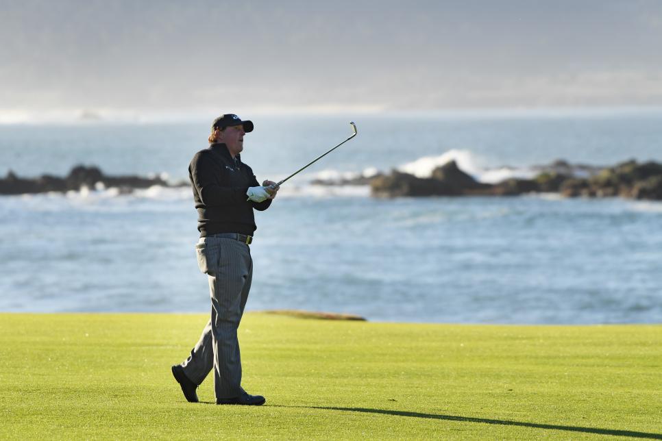 PEBBLE BEACH, CALIFORNIA - FEBRUARY 11:  Phil Mickelson of the United States plays a shot on the 18th hole during the continuation of the final round of the AT&T Pebble Beach Pro-Am at Pebble Beach Golf Links on February 11, 2019 in Pebble Beach, California. (Photo by Harry How/Getty Images)