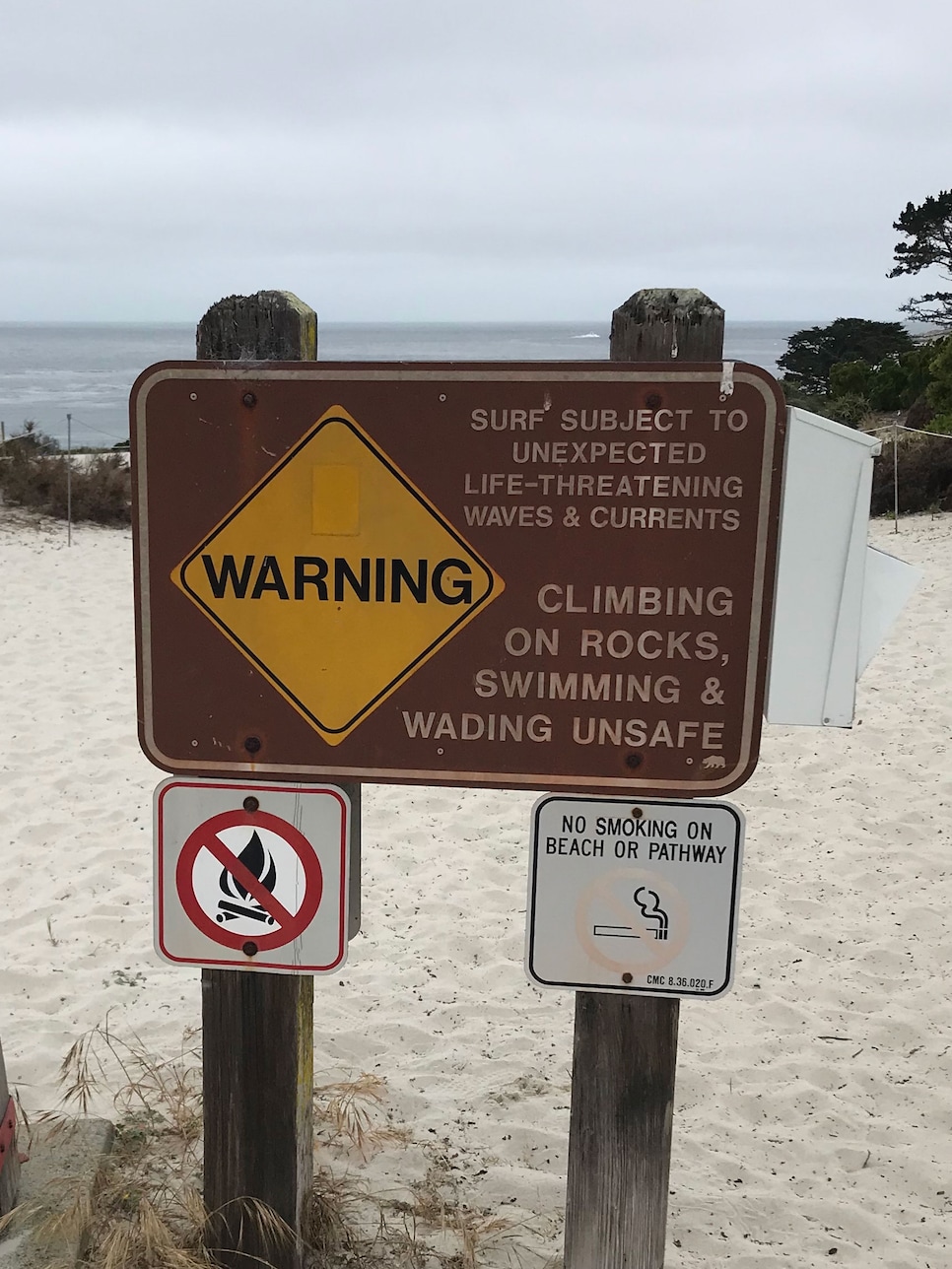 dave-kindred-beach-sign-pebble-beach.jpg