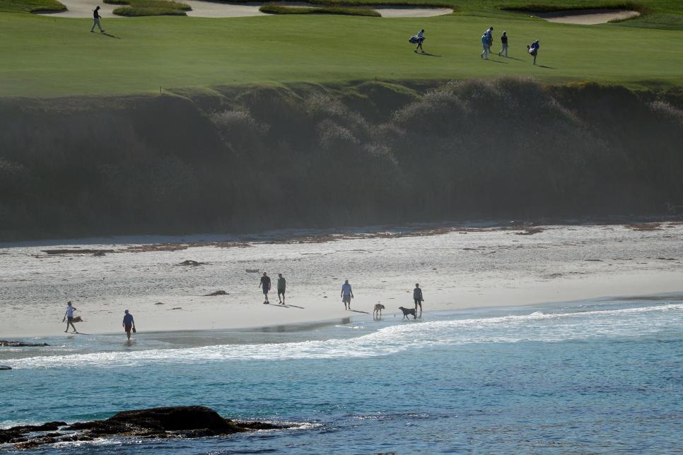 PEBBLE BEACH, CALIFORNIA - JUNE 11: A general view of the beach is seen as golfers walk on the 10th hole during a practice round prior to the 2019 U.S. Open at Pebble Beach Golf Links on June 11, 2019 in Pebble Beach, California. (Photo by Warren Little/Getty Images)