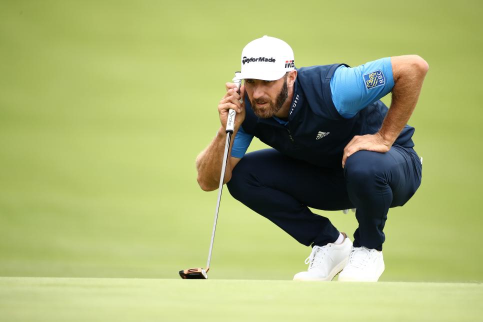 PEBBLE BEACH, CALIFORNIA - JUNE 14: Dustin Johnson of the United States lines up a putt on the third green during the second round of the 2019 U.S. Open at Pebble Beach Golf Links on June 14, 2019 in Pebble Beach, California. (Photo by Ezra Shaw/Getty Images)