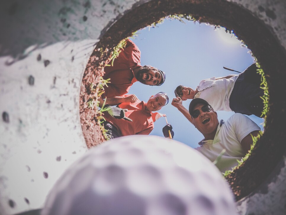 golfers-seeing-ball-in-hole.jpg