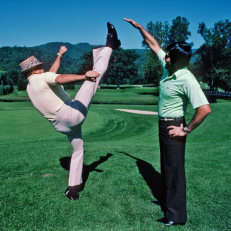 American golfer Sam Snead (left) demonstrates his fitness to Spain\'s Severiano Ballesteros during preparations for the Ryder Cup match being played at The Greenbrier in West Virginia, USA, 1979. (Photo by Phil Sheldon/Popperfoto/Getty Images)