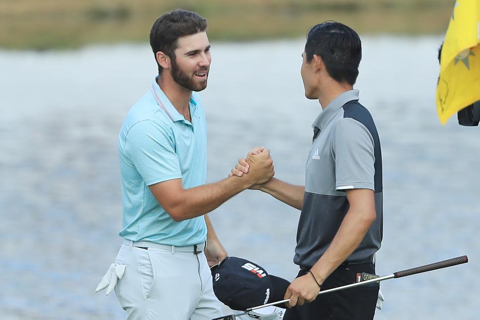 BLAINE, MINNESOTA - JULY 07: Matthew Wolff of the United States shakes hands with Collin Morikawa of the United States on the 18th green after the final round of the 3M Open at TPC Twin Cities on July 07, 2019 in Blaine, Minnesota. (Photo by Sam Greenwood/Getty Images)