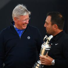 PORTRUSH, NORTHERN IRELAND - JULY 15:  R&A chief executive Martin Slumbers receives the Claret Jug from 2018 Champion Francesco Molinari of Italy prior to the 148th Open Championship held on the Dunluce Links at Royal Portrush Golf Club on July 15, 2019 in Portrush, United Kingdom. (Photo by Richard Heathcote/R&A/R&A via Getty Images )