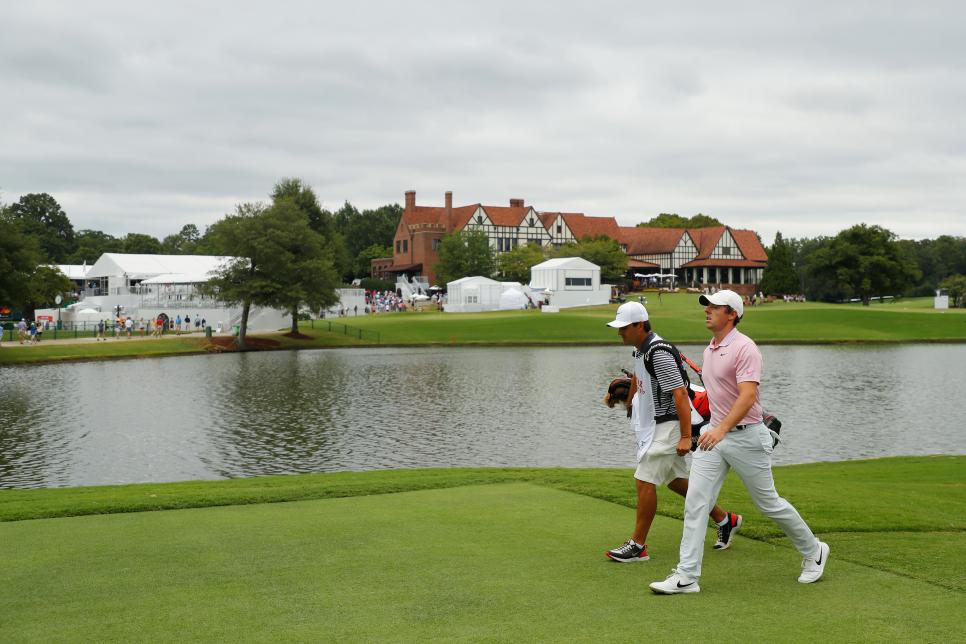 ATLANTA, GEORGIA - AUGUST 25: Rory McIlroy of Northern Ireland and caddie Harry Diamond walk during the final round of the TOUR Championship at East Lake Golf Club on August 25, 2019 in Atlanta, Georgia. (Photo by Kevin C. Cox/Getty Images)