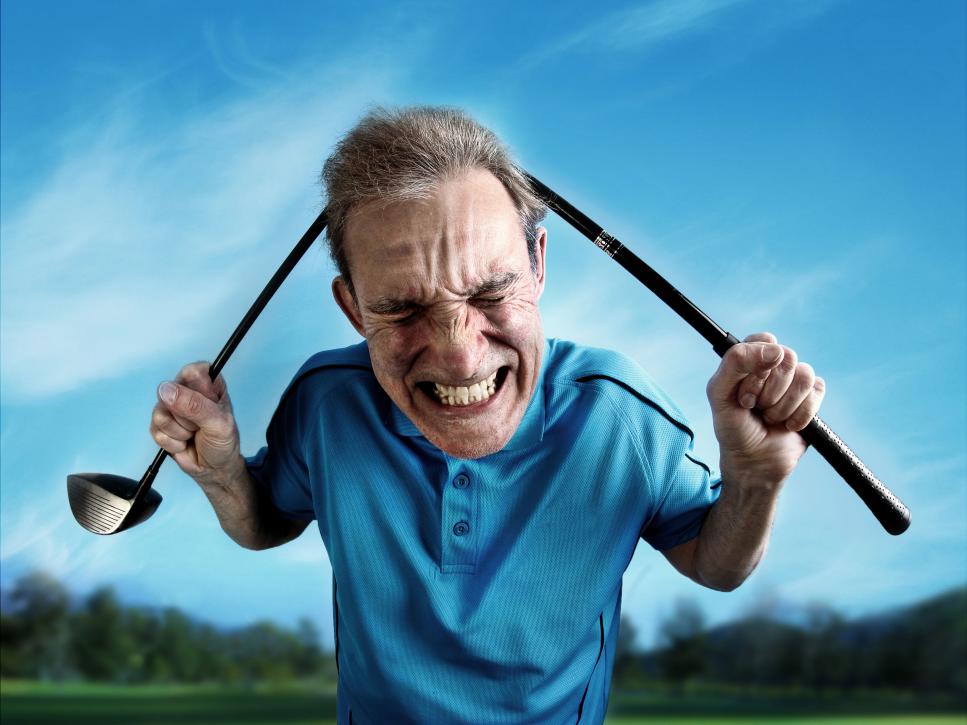 An angry, frustrated golfer bends a club over his head. Wide-angle lens distortion adds a humorous, cartoonish appearance to the subject.