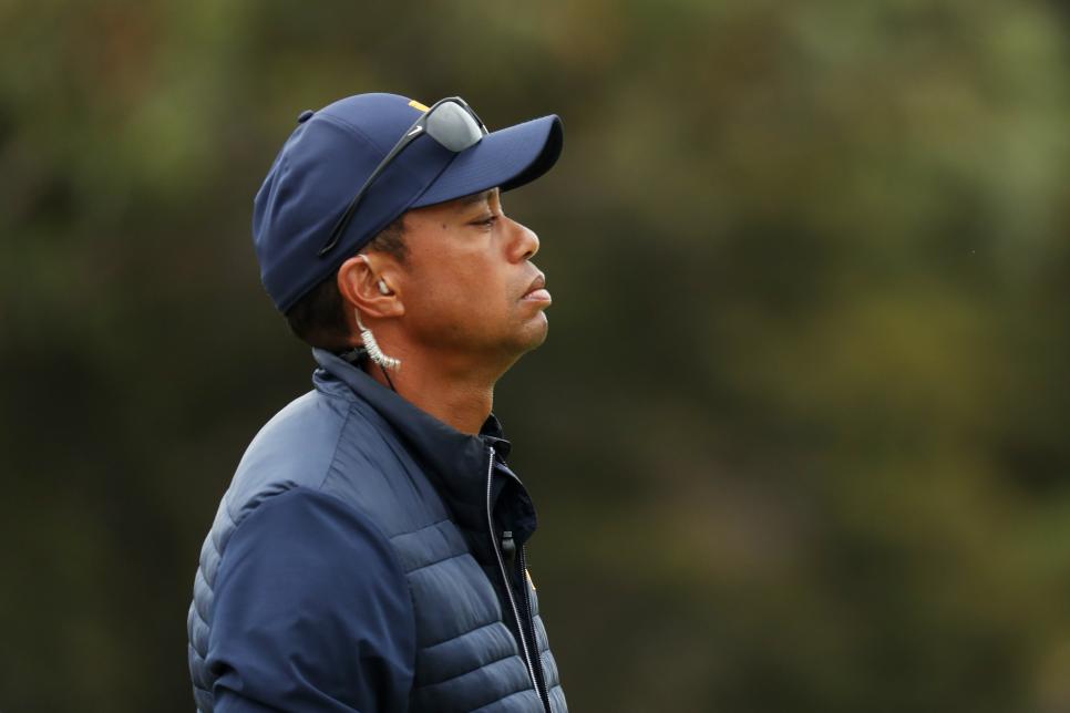 MELBOURNE, AUSTRALIA - DECEMBER 14: Playing Captain Tiger Woods of the United States team looks on over the 4th hole during Saturday afternoon foursomes matches on day three of the 2019 Presidents Cup at Royal Melbourne Golf Course on December 14, 2019 in Melbourne, Australia. (Photo by Rob Carr/Getty Images)
