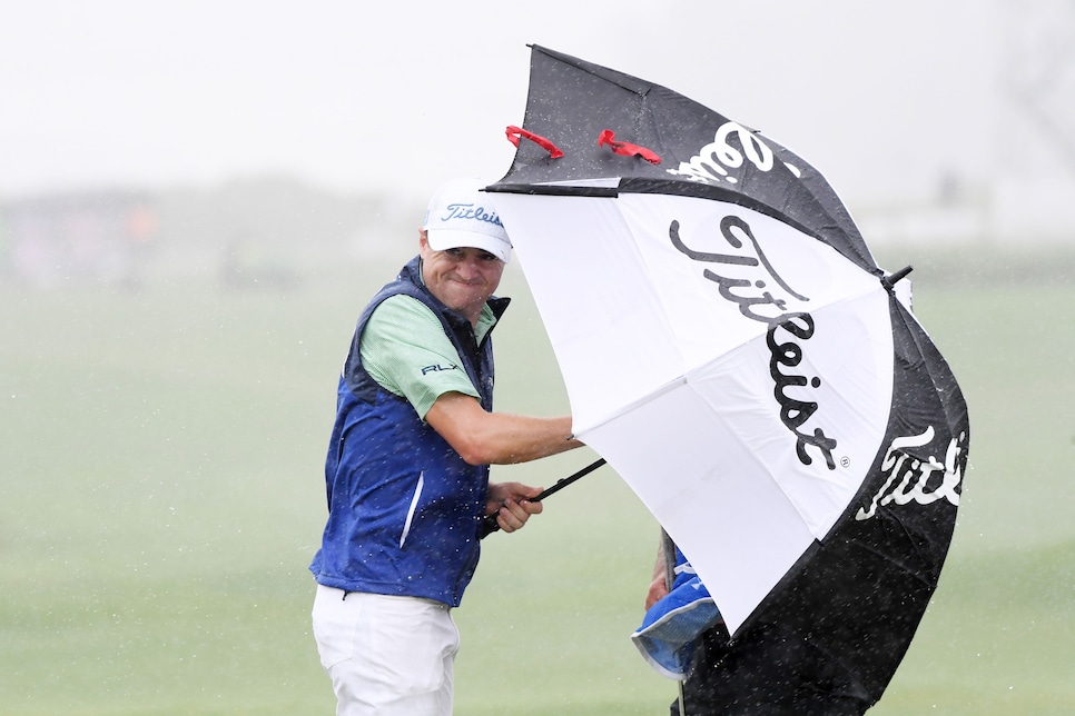 Justin Thomas questions his choice of white pants when he wrecks them