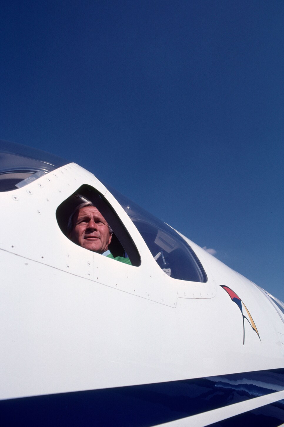 leonard-kamsler-arnold-palmer-pilot-plane-vertical.jpg