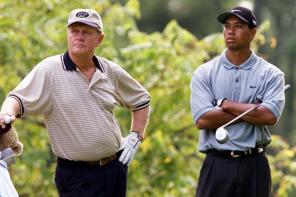 jack-nicklaus-tiger-woods-on-course-playing.jpg