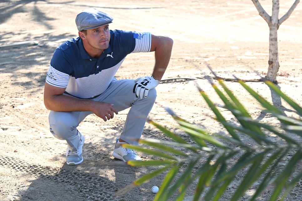 bryson-dechambeau-abu-dhabi-2020-desert-contemplating-shot.jpg