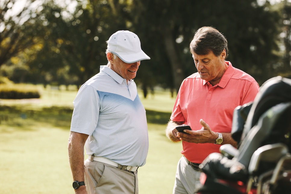 Senior man taking break from golfing