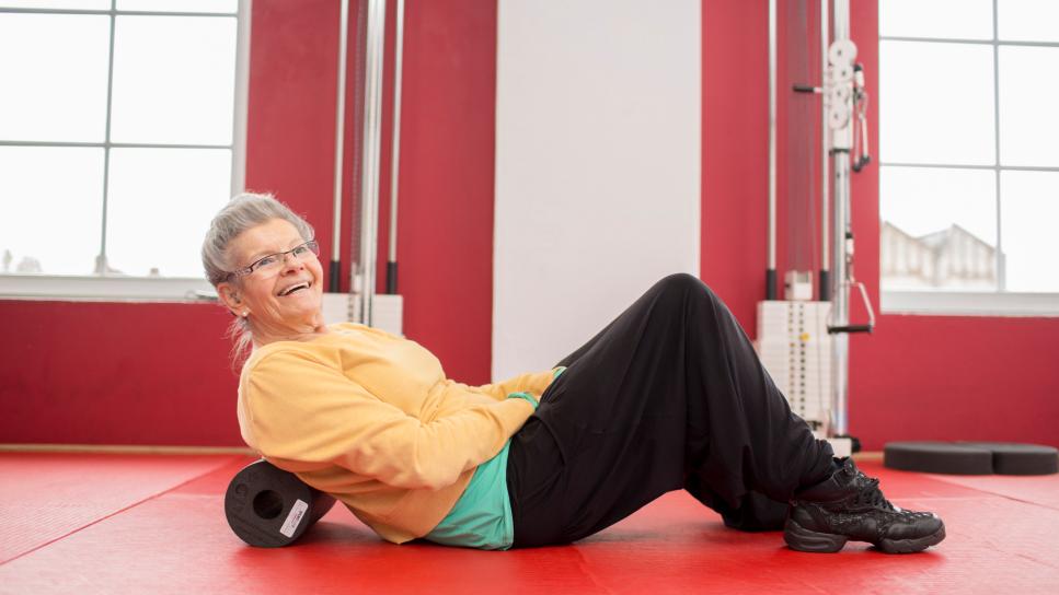 Senior Woman Exercising In A Gym