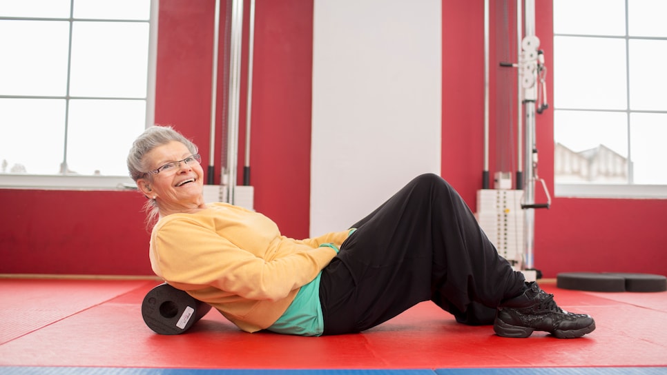 Senior Woman Exercising In A Gym