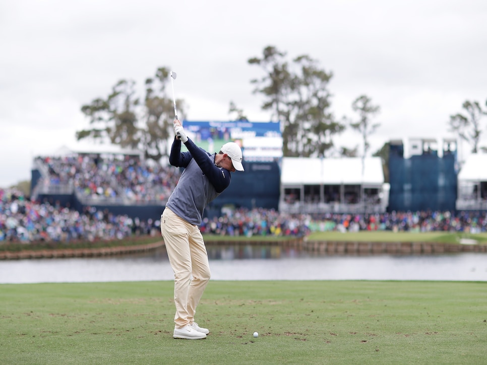 PONTE VEDRA BEACH, FLORIDA - MARCH 17: Rory McIlroy of Northern Ireland plays his shot from the 17th tee during the final round of The PLAYERS Championship on The Stadium Course at TPC Sawgrass on March 17, 2019 in Ponte Vedra Beach, Florida. (Photo by Richard Heathcote/Getty Images)