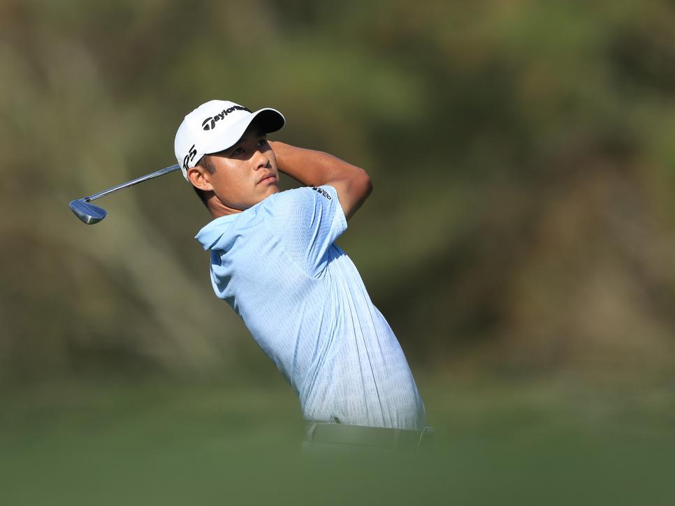 PONTE VEDRA BEACH, FLORIDA - MARCH 12: Collin Morikawa of the United States plays a shot on the 14th hole during the first round of The PLAYERS Championship on The Stadium Course at TPC Sawgrass on March 12, 2020 in Ponte Vedra Beach, Florida. (Photo by Sam Greenwood/Getty Images)