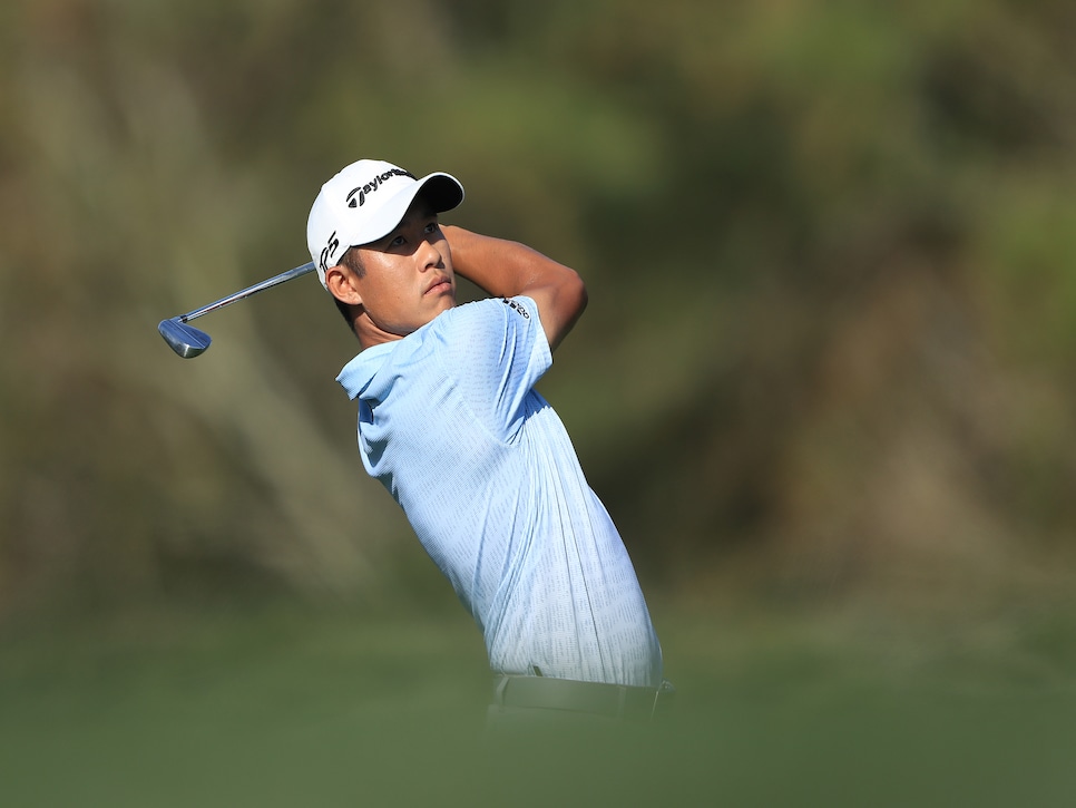 PONTE VEDRA BEACH, FLORIDA - MARCH 12: Collin Morikawa of the United States plays a shot on the 14th hole during the first round of The PLAYERS Championship on The Stadium Course at TPC Sawgrass on March 12, 2020 in Ponte Vedra Beach, Florida. (Photo by Sam Greenwood/Getty Images)